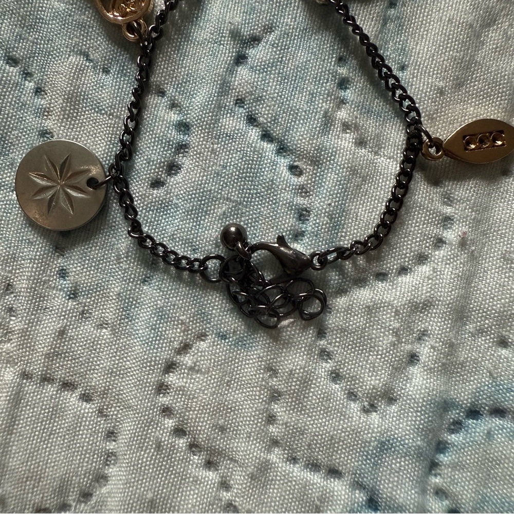 Elegant Multi-Charm Bracelet in Black and Gold - Picture 6 of 9